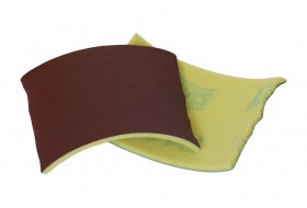Abrasive cloth with a soft foam backing